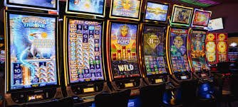 xlotomania စလော့ Reels Spinning — Jackpot Symbol တန်းကိုက်မှု မြင်ကွင်း